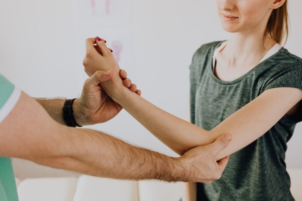 Chiropractor examining a patient as part of chiropractic marketing services