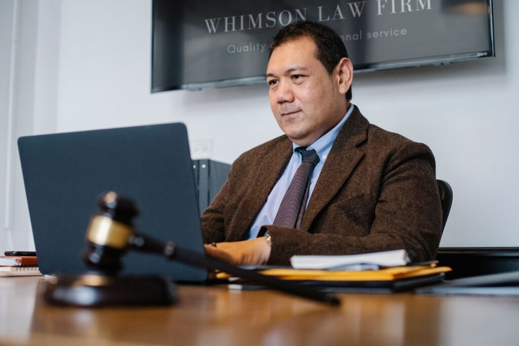Personal injury law firm reviewing new client inquiries generated through marketing