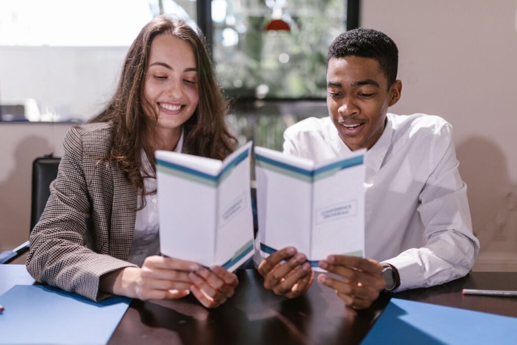 Accountant reviewing financial documents with a client as part of accountant and CPA marketing services